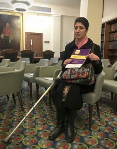 ALLFIE Researcher and Accessibility Plans report author, Dr Armineh Soorenian with the report